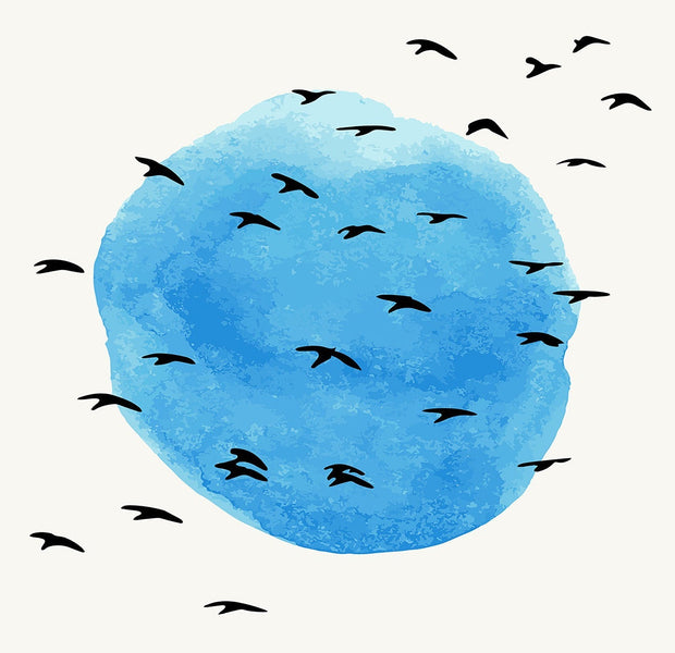 Wall mural of a blue sky with silhouettes of birds in flight