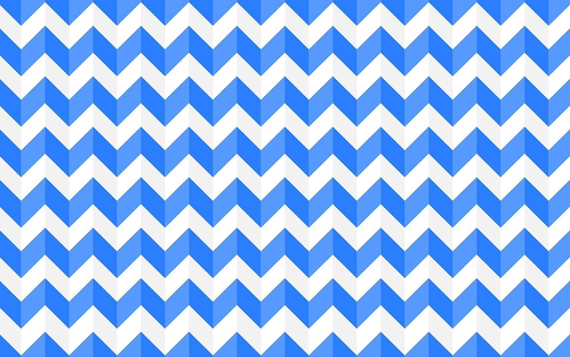 Interior wall with a blue and white chevron pattern mural