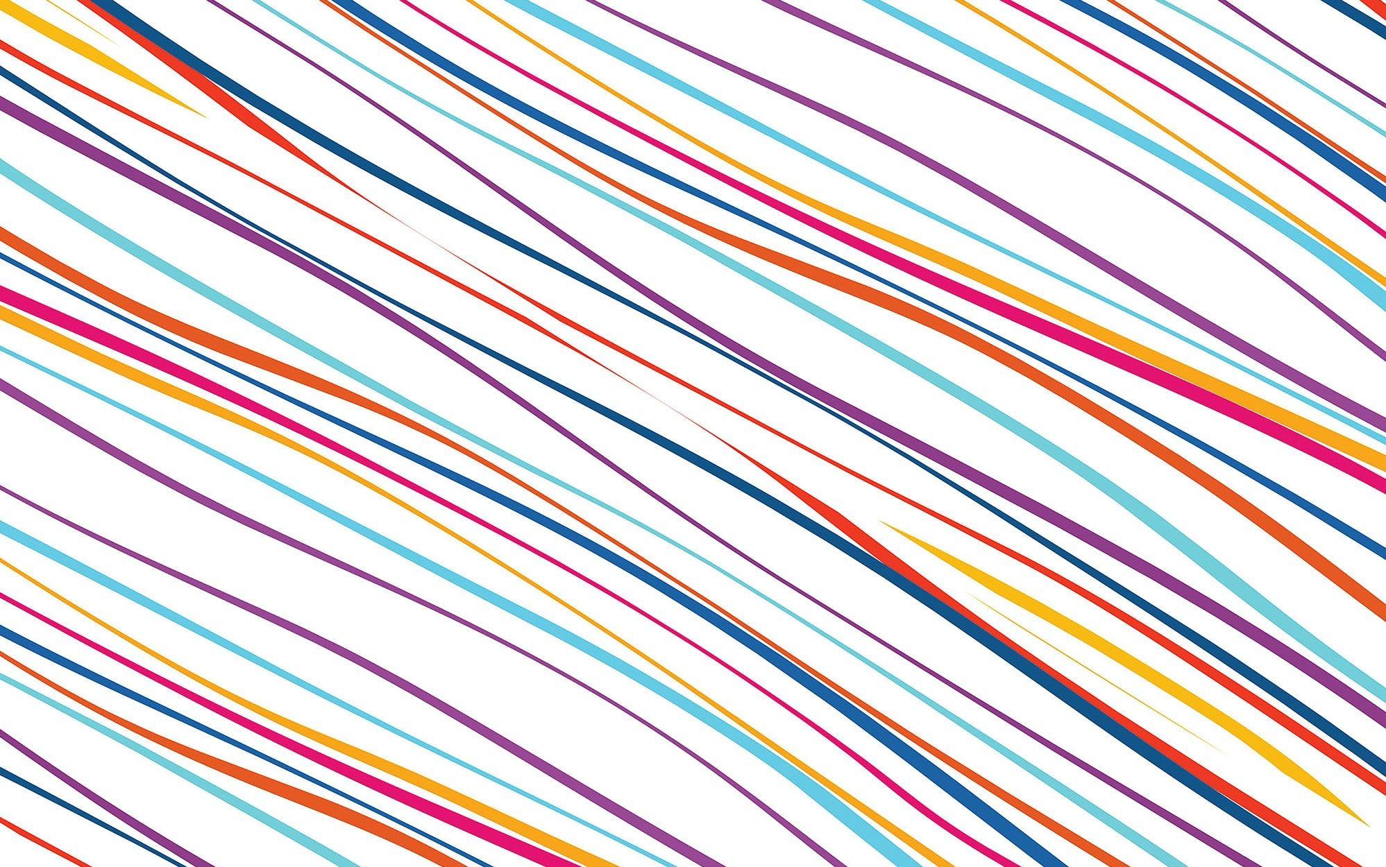 Abstract diagonal stripes pattern in multiple colors as a wall mural in an interior setting