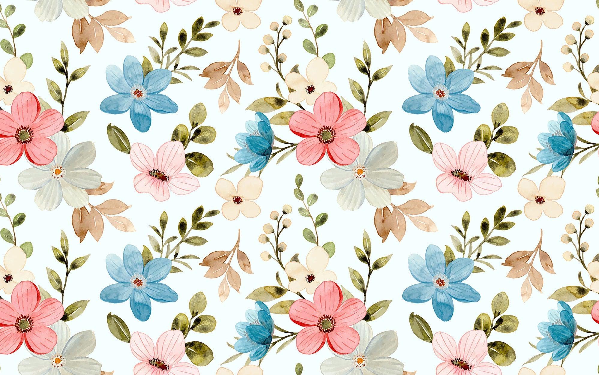 A colorful wall mural featuring a pattern of hand-painted flowers in shades of pink and blue with green foliage accents
