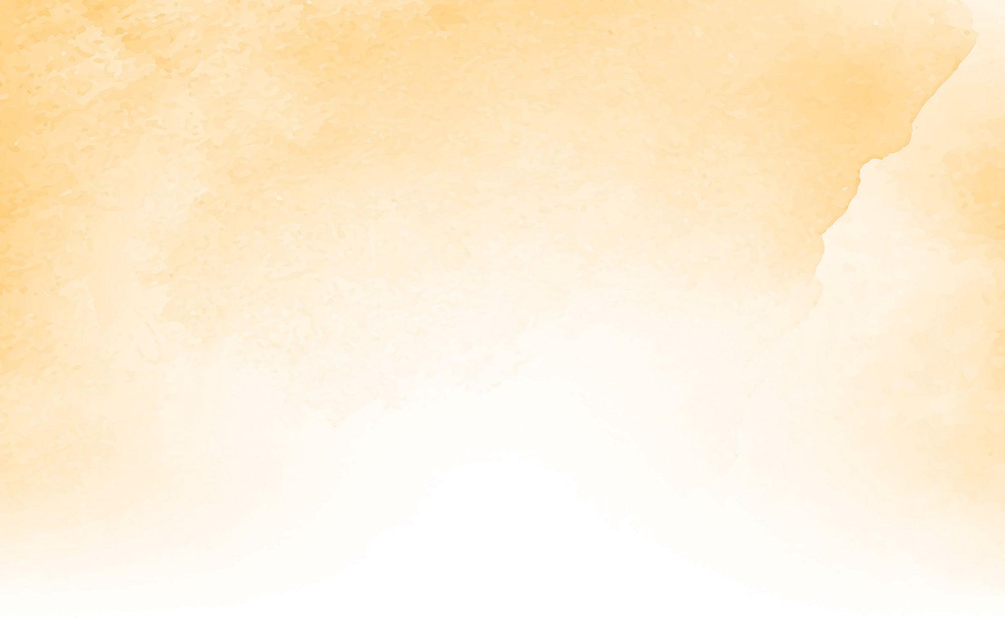 Abstract orange and yellow watercolor wall mural in an interior setting