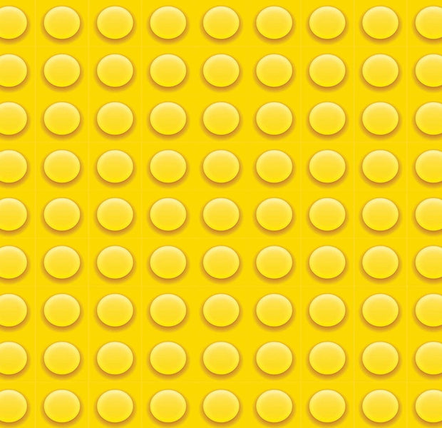 Close-up texture of a yellow LEGO plate with studs