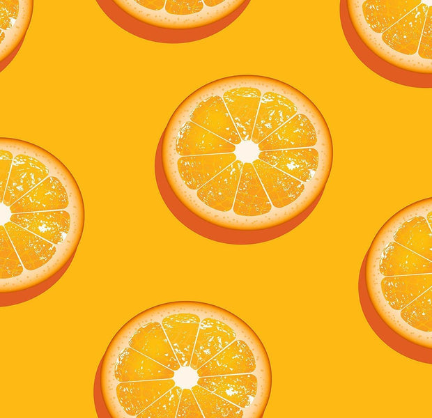 Vibrant orange slices pattern on a yellow wall mural creating a fresh and juicy wallpaper design