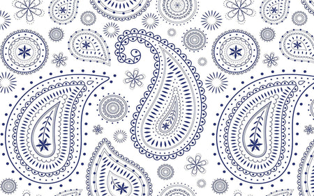 Intricate blue paisley pattern on a white wall mural in an interior setting