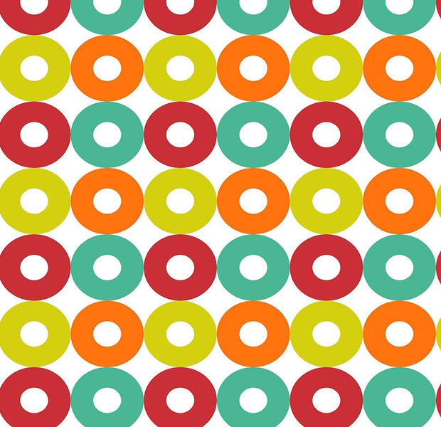 A vibrant wall mural featuring a repeating pattern of colorful circles in shades of green, red, orange, and yellow.
