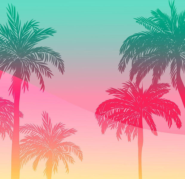 Colorful wall mural of palm trees with a gradient sunset background