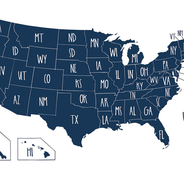 A wall mural of the United States map with state abbreviations in an interior setting