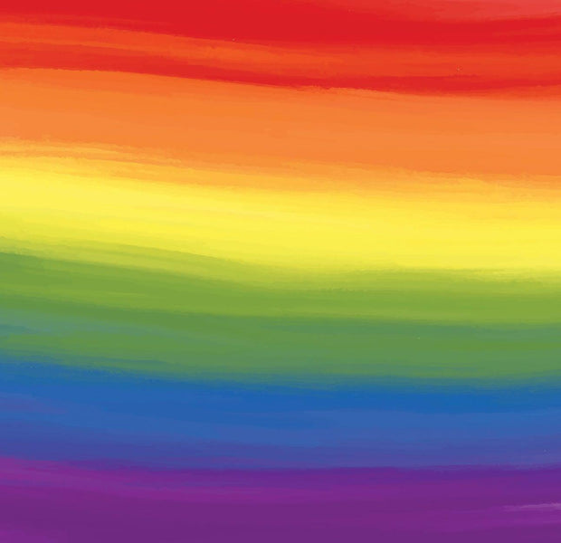 Colorful rainbow gradient wall mural on an interior wall