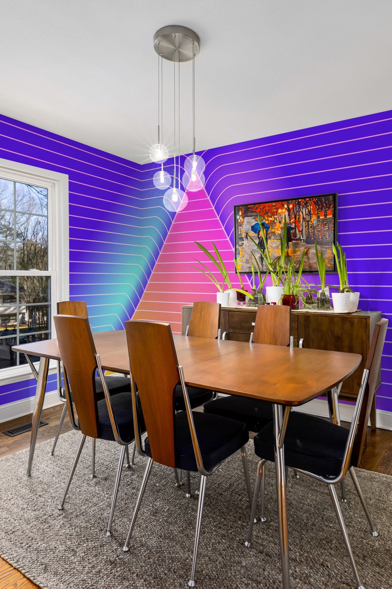A contemporary dining room with bold purple striped walls and a vibrant wall mural above a wooden table with chairs