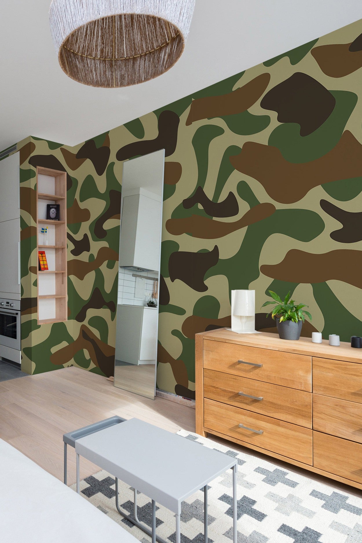 Interior of a modern living room featuring a large camouflage wall mural with contemporary furniture and decor.