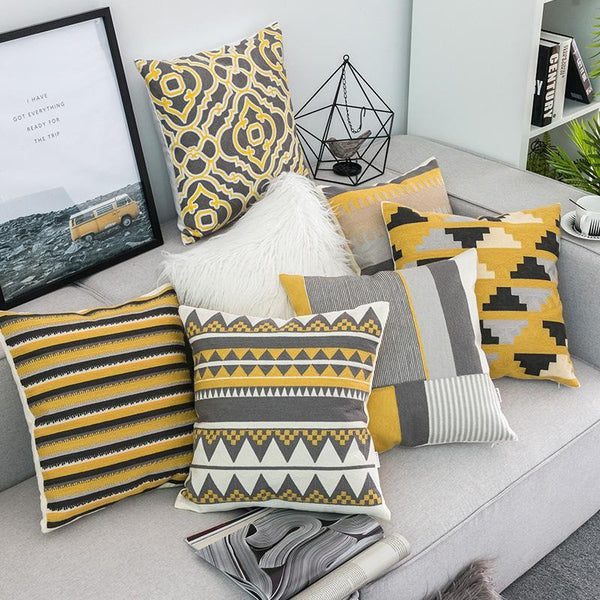 https://tiptophomedecor.com/cdn/shop/products/embroidered-yellow-grey-geometric-throw-pillow-cases-2_1024x.jpg?v=1617470698
