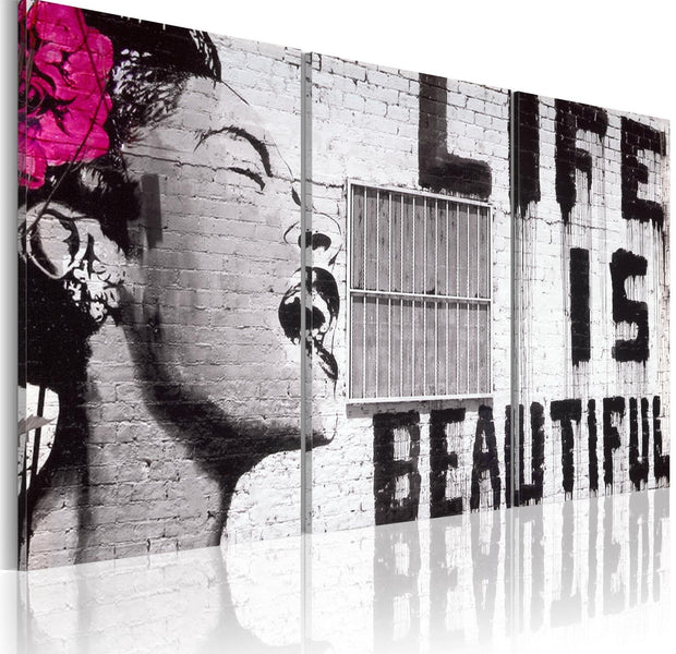 Stretched Canvas Street Art - Banksy: Life Is Beautiful 3 Piece Wide-Tiptophomedecor