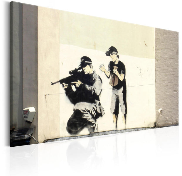 Stretched Canvas Street Art - Banksy: Sniper And Child-Tiptophomedecor