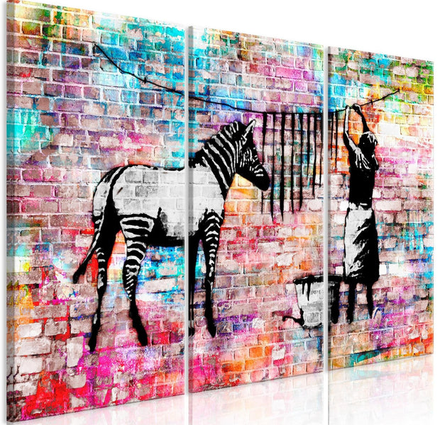 Stretched Canvas Street Art - Banksy: Washing Zebra Stripes 3 Piece-Tiptophomedecor